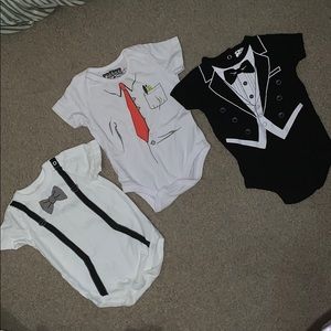 3 novelty onesies